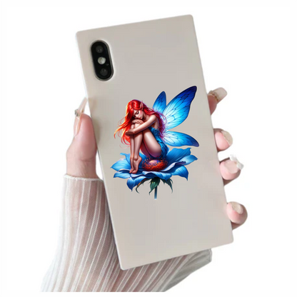 Neon blue fairy sitting on a flower vinyl sticker decal