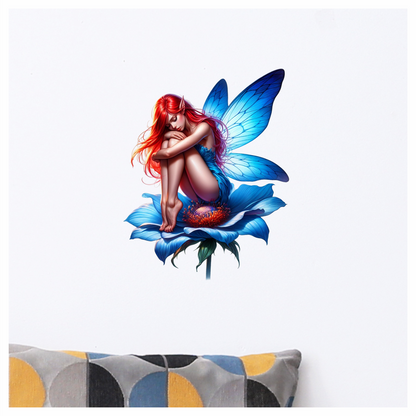 Neon blue fairy sitting on a flower vinyl sticker decal